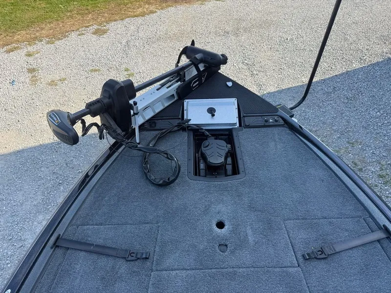 Slide: The Image of 2026 Phoenix 721 ZXL boat deck with trolling motor and control panel. - 12