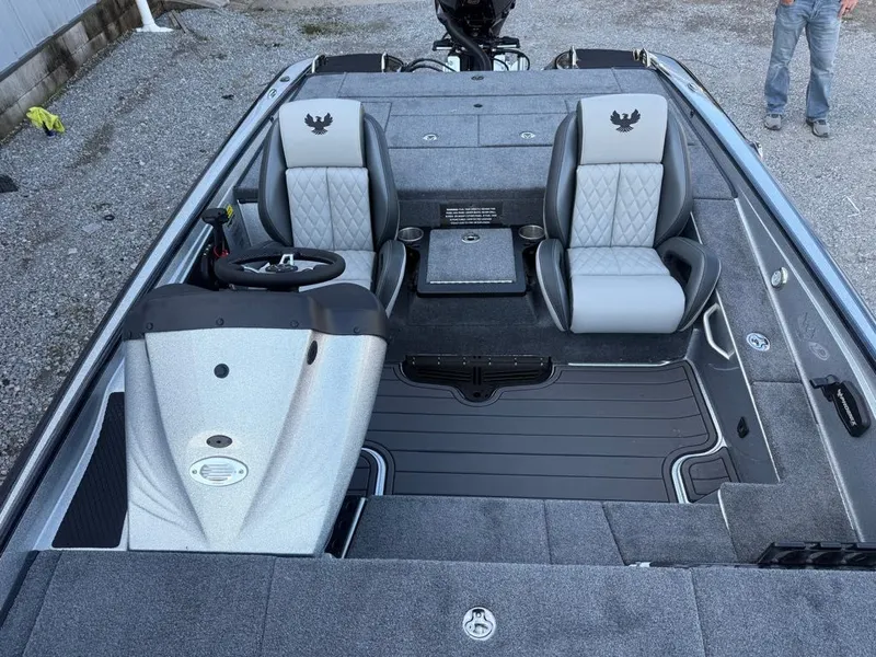Slide: The Image of 2026 Phoenix 721 ZXL boat interior with dual seats and steering console. - 4