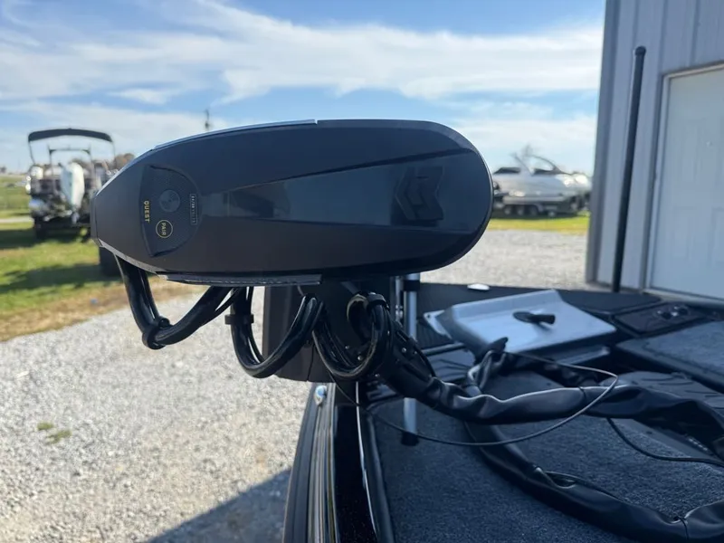 Slide: The Image of Close-up of a 2026 Phoenix 721 ZXL boat motor in a sunny outdoor setting. - 5