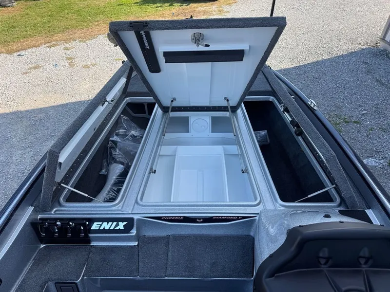 Slide: The Image of Open storage compartments of a 2026 Phoenix 721 ZXL boat, showcasing interior space. - 6