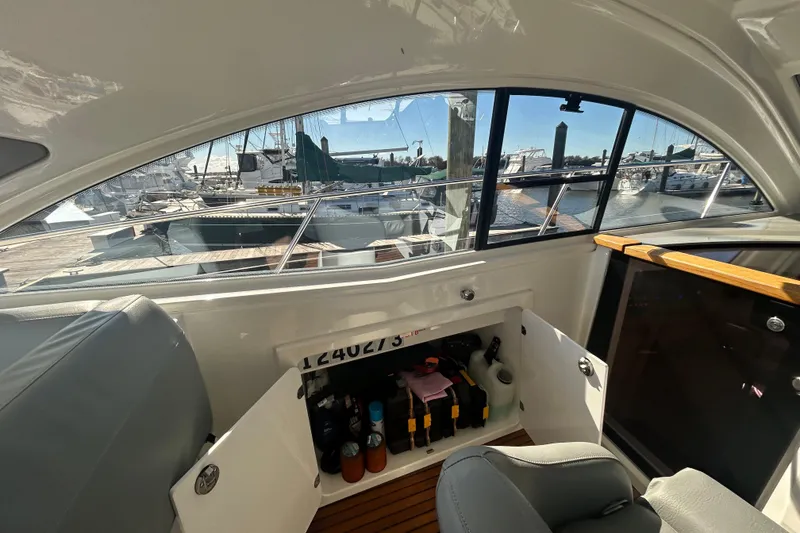 Slide: The Image of Interior view of 2012 Beneteau Gran Turismo 44 yacht with open storage compartment. - 12