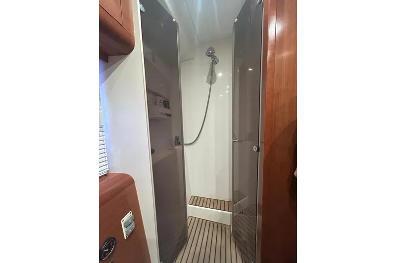 Slide: The Image of Shower area in 2012 Beneteau Gran Turismo 44 yacht with wooden flooring. - 29