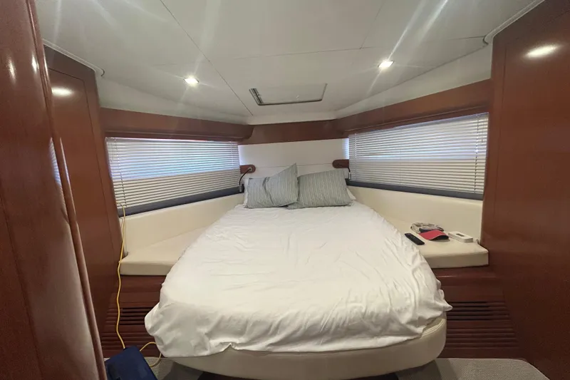 Slide: The Image of Luxurious cabin interior of 2012 Beneteau Gran Turismo 44 yacht with cozy bed. - 35