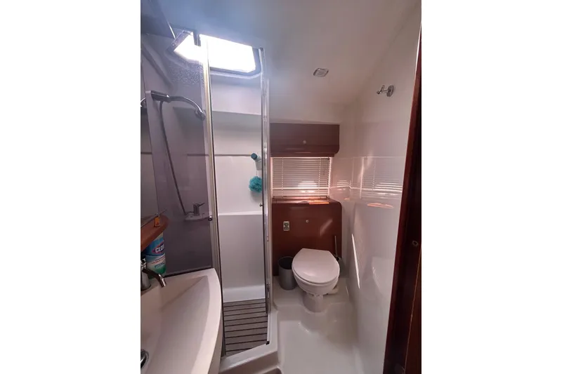 Slide: The Image of Bathroom interior of 2012 Beneteau Gran Turismo 44 yacht, featuring shower and toilet. - 40