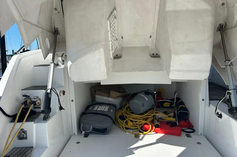 Slide: The Image of Storage compartment of a 2012 Beneteau Gran Turismo 44 with boating equipment. - 49