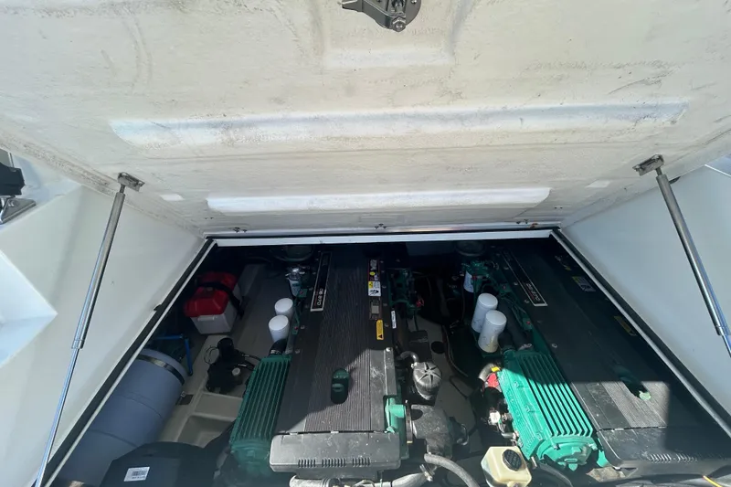 Slide: The Image of Engine compartment of 2012 Beneteau Gran Turismo 44 yacht, showcasing dual engines. - 52