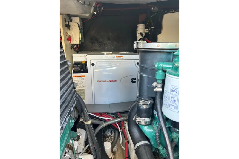 Slide: The Image of Engine room of 2012 Beneteau Gran Turismo 44 with Cummins Onan generator. - 53