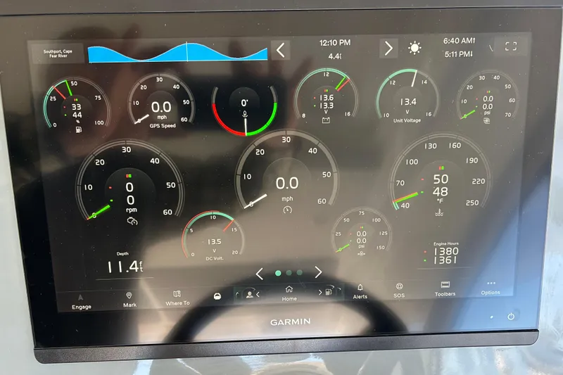 Slide: The Image of Garmin display on 2012 Beneteau Gran Turismo 44 showing navigation and engine metrics. - 57