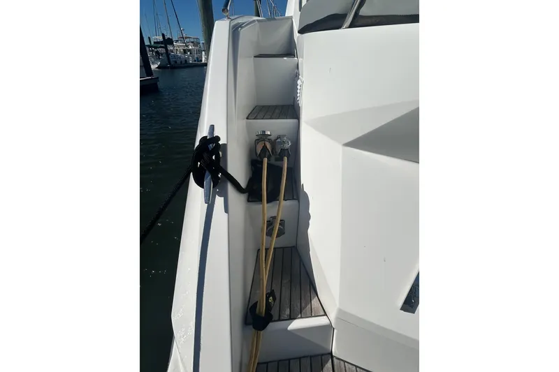 Slide: The Image of Beneteau Gran Turismo 44 yacht deck with mooring lines and docked at marina, 2012 model. - 6