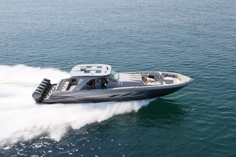 Slide: The Image of 2026 Deep Impact 499 Sport boat speeding on open water. - 1