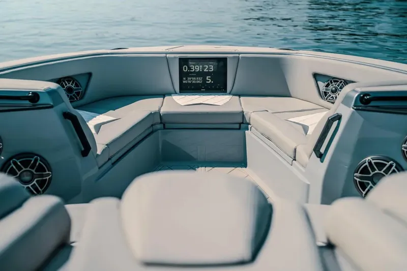 Slide: The Image of Interior of 2026 Deep Impact 499 Sport boat with seating and navigation display. - 41