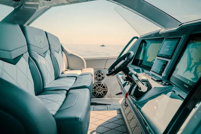 Slide: The Image of Luxurious interior of 2026 Deep Impact 499 Sport boat with advanced navigation systems. - 57