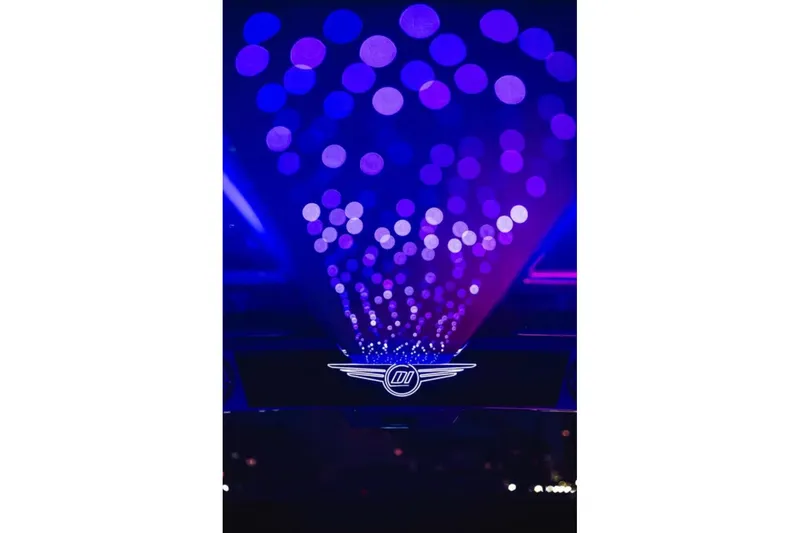 Slide: The Image of Futuristic Deep Impact 499 Sport 2026 logo with vibrant purple lights. - 60