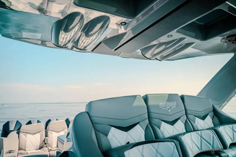 Slide: The Image of Luxurious interior of 2026 Deep Impact 499 Sport boat with ocean view. - 63