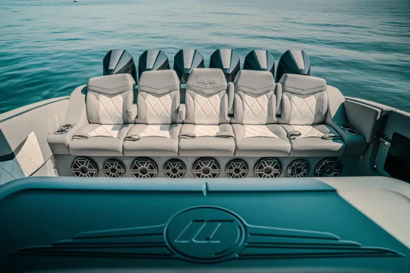 Slide: The Image of Luxury seating on 2026 Deep Impact 499 Sport boat with multiple engines. - 71
