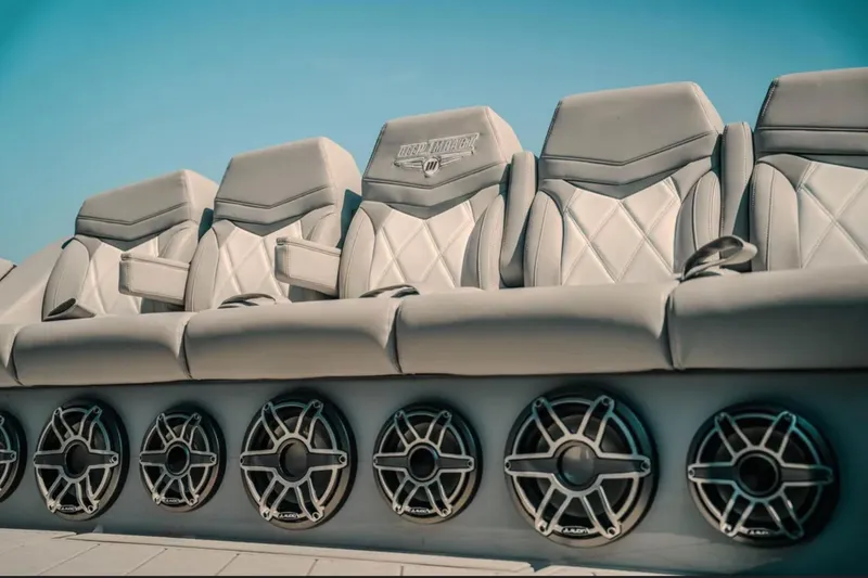 Slide: The Image of Luxury seating and speakers on 2026 Deep Impact 499 Sport boat. - 72