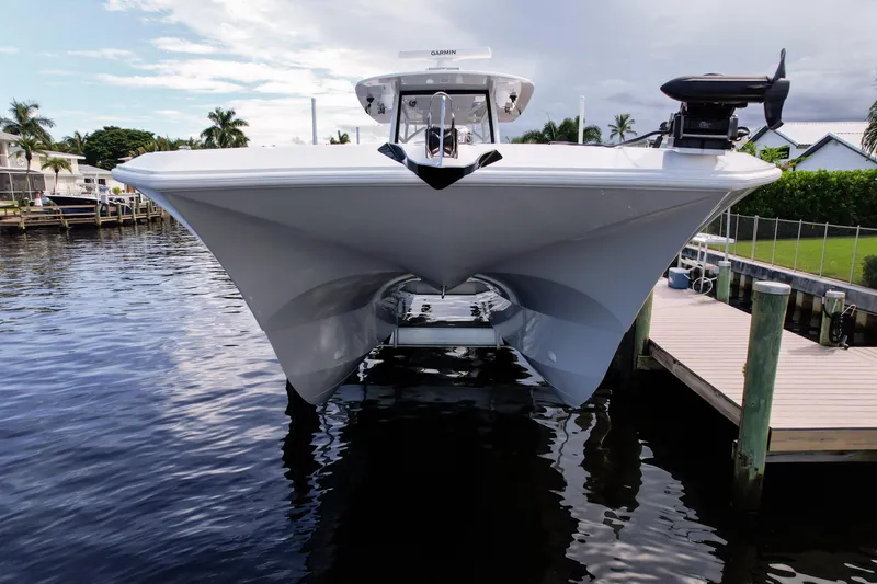 Slide: The Image of Front Runner 43 Catamaran 2025 docked, showcasing sleek design and modern features. - 2