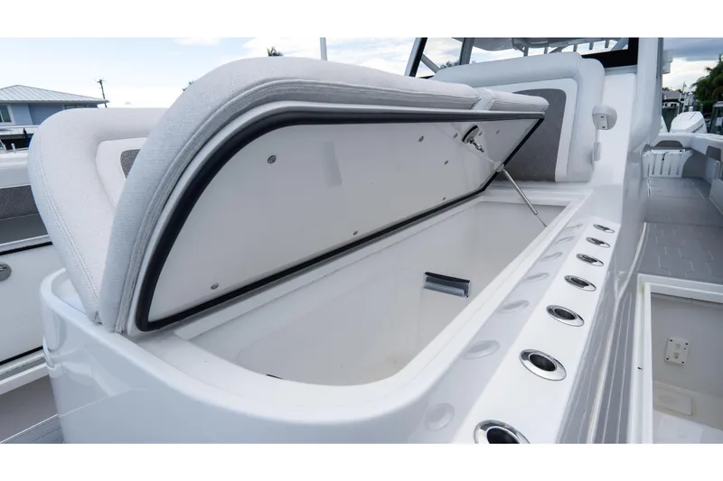 Slide: The Image of Open storage compartment on 2025 Front Runner 43 Catamaran, showcasing sleek design and functionality. - 26