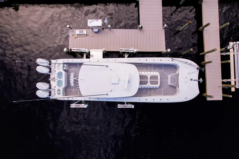 Slide: The Image of Aerial view of 2025 Front Runner 43 Catamaran docked at a marina. - 3