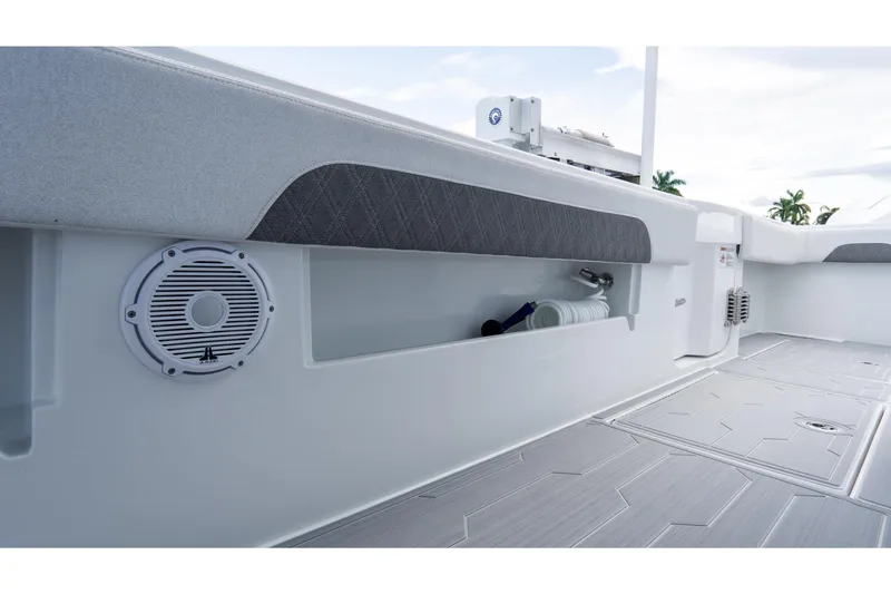 Slide: The Image of 2025 Front Runner 43 Catamaran interior with speaker and storage compartment. - 32