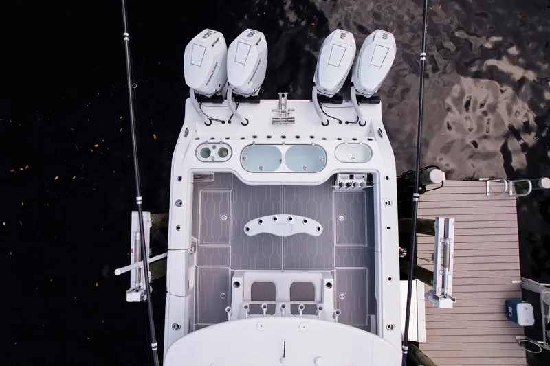 Slide: The Image of Overhead view of 2025 Front Runner 43 Catamaran at dock with four engines. - 4