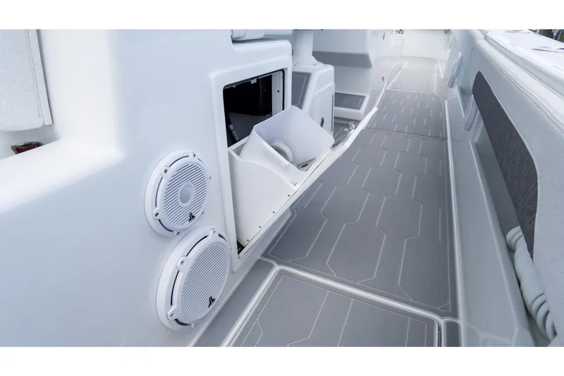 Slide: The Image of 2025 Front Runner 43 Catamaran interior with speakers and storage compartments. - 54