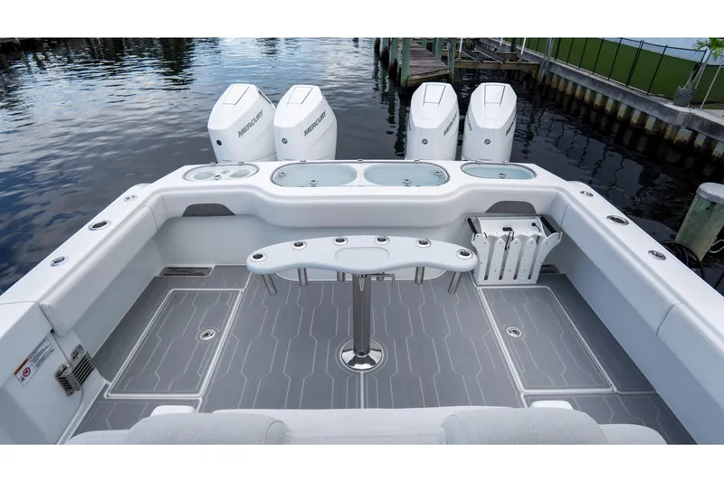 Slide: The Image of 2025 Front Runner 43 Catamaran with spacious deck, modern design, and powerful Mercury engines. - 56