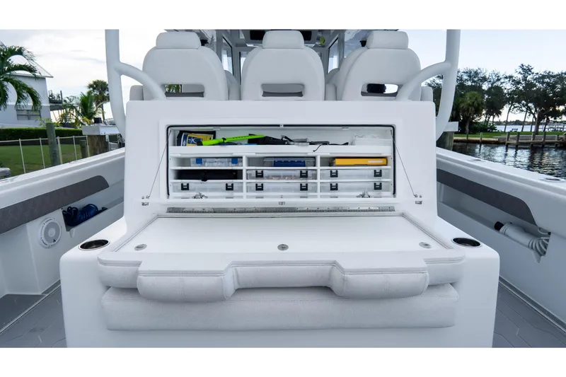 Slide: The Image of 2025 Front Runner 43 Catamaran with open storage compartment, showcasing organized fishing gear. - 61