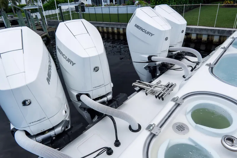 Slide: The Image of 2025 Front Runner 43 Catamaran with Mercury Verado engines docked at marina. - 69