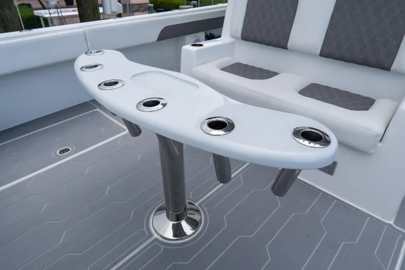 Slide: The Image of Luxury seating area on 2025 Front Runner 43 Catamaran with cup holders. - 71