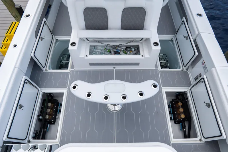 Slide: The Image of 2025 Front Runner 43 Catamaran deck with storage compartments and seating. - 74
