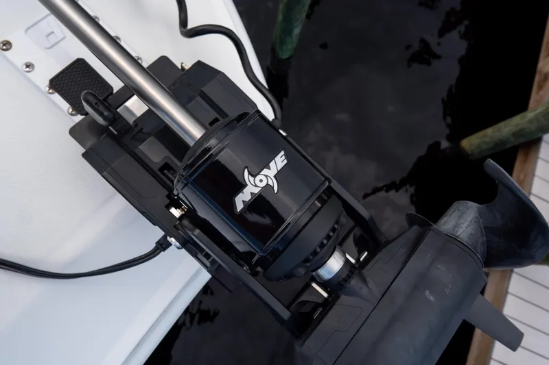 Slide: The Image of Close-up of a 2025 Front Runner 43 Catamaran motor component at a dock. - 78