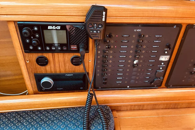 Slide: The Image of Control panel of a 2005 Hunter 33 sailboat with B&G and Fusion equipment. - 32