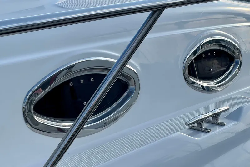 Slide: The Image of Close-up of 2004 Sea Ray 320 Sundancer boat windows and cleat. - 14