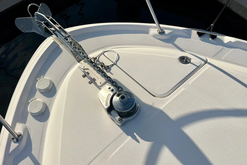 Slide: The Image of Bow of 2004 Sea Ray 320 Sundancer with anchor and winch system. - 19