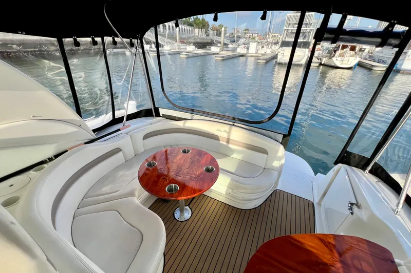 Slide: The Image of Luxurious 2004 Sea Ray 320 Sundancer yacht interior with marina view. - 25