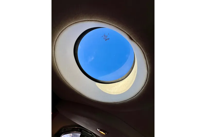 Slide: The Image of Circular skylight view from 2004 Sea Ray 320 Sundancer boat interior. - 60