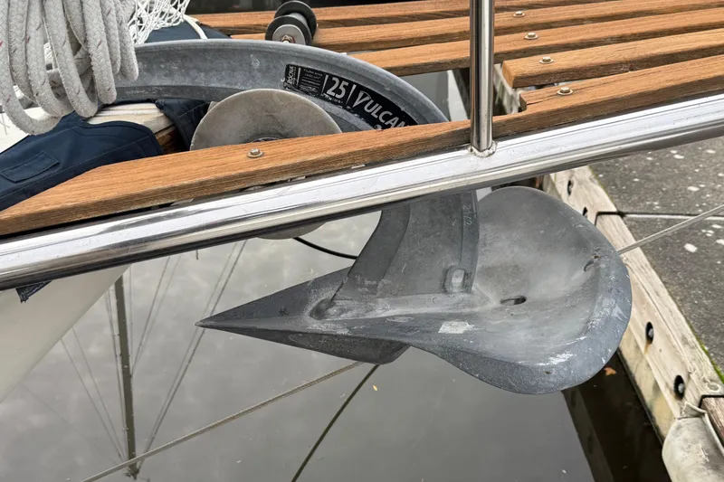 Slide: The Image of 1980 Nauticat Pilothouse boat with Vulcan anchor and wooden deck details. - 19