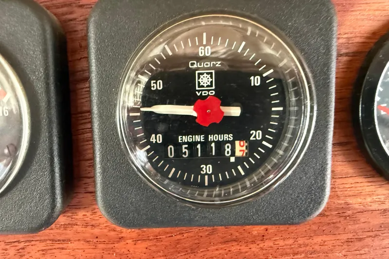 Slide: The Image of VDO engine hour meter showing 5118.7 hours on a 1980 Nauticat Pilothouse. - 36