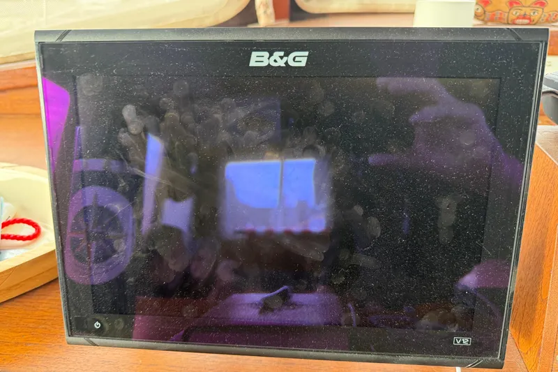 Slide: The Image of B&G marine display in a 1980 Nauticat Pilothouse, showing reflections and fingerprints. - 38