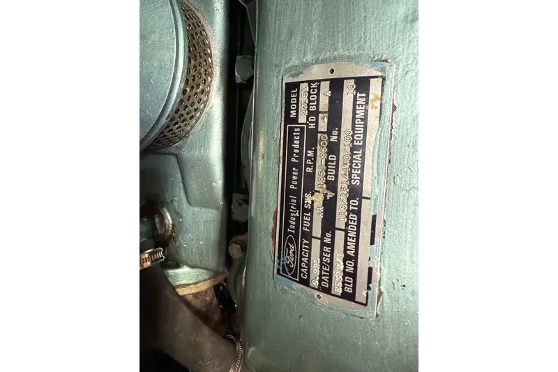 Slide: The Image of Close-up of a 1980 Nauticat Pilothouse engine plate with specifications. - 40