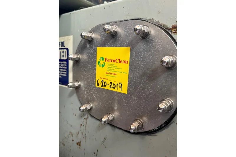 Slide: The Image of 1980 Nauticat Pilothouse engine part with PetroClean service sticker dated 6-20-2019. - 42