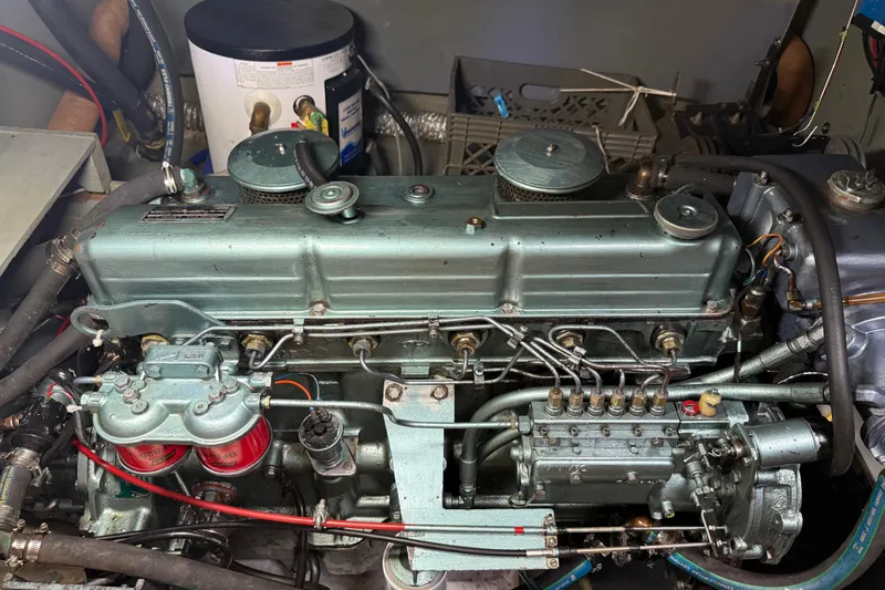 Slide: The Image of Engine of a 1980 Nauticat Pilothouse boat, showcasing intricate mechanical components. - 47