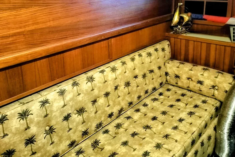 Slide: The Image of Luxurious interior of 1988 Chris-Craft 46 Constellation yacht with cozy seating and modern decor. - 8