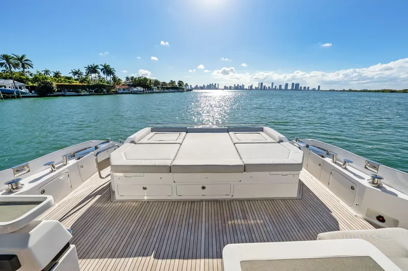 Slide: The Image of Luxurious 2019 Azimut S7 yacht deck with ocean view and city skyline. - 12