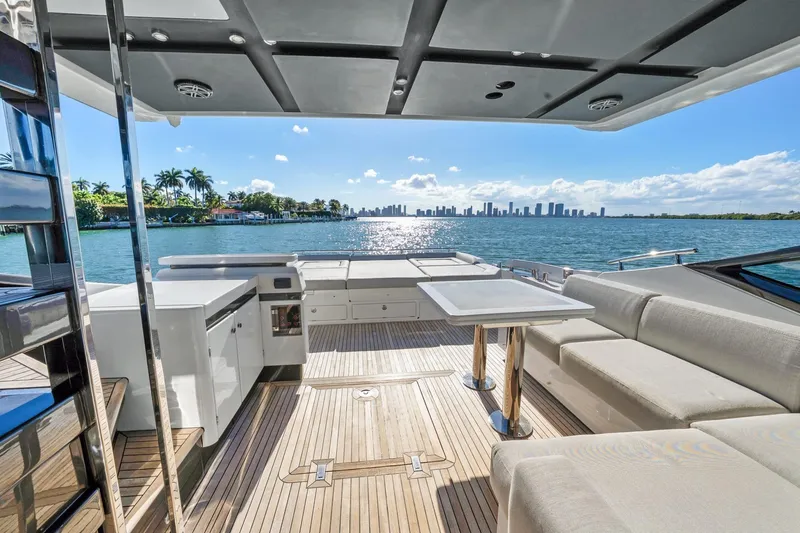 Slide: The Image of Luxurious 2019 Azimut S7 yacht deck with ocean view and city skyline. - 14