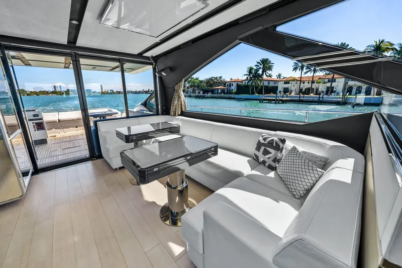 Slide: The Image of Luxurious interior of 2019 Azimut S7 yacht with waterfront view and modern seating. - 36