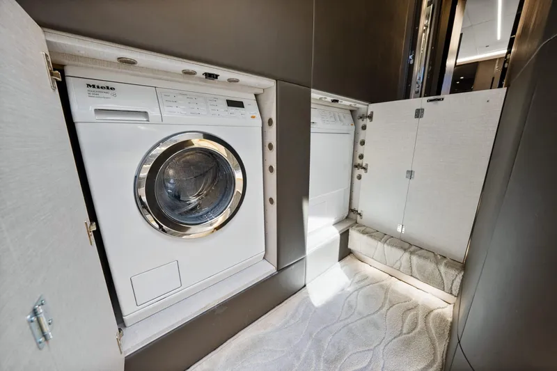 Slide: The Image of Laundry area with Miele washing machine in 2019 Azimut S7 yacht. - 38