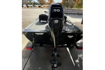 Slide: The Image of 2025 Tracker Bass Tracker Classic XL with 50 HP outboard motor, rear view. - 4