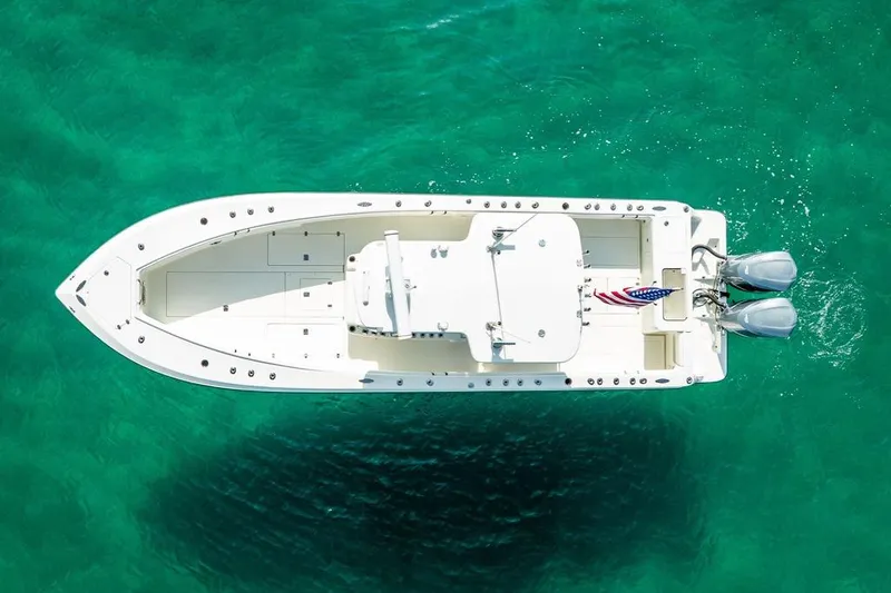 Slide: The Image of Aerial view of 2014 SeaVee 34 boat on clear turquoise water. - 11